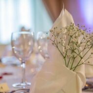 Elegant table setting with flowers and wine glasses at Old Ground Hotel.