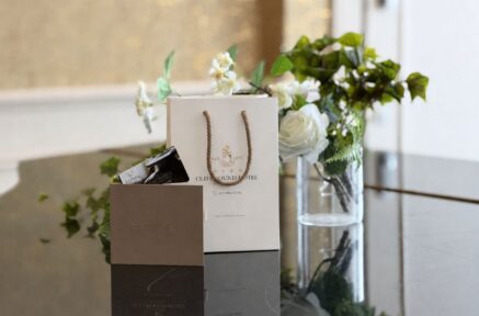 Elegant gift bags and floral decor at Old Ground Hotel lounge.